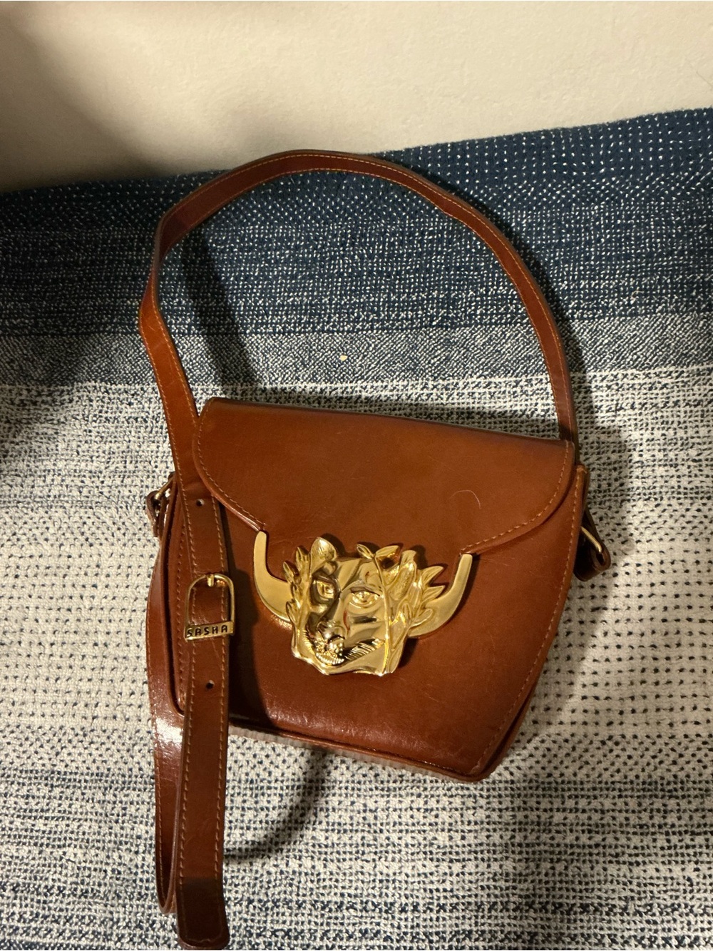 Sasha Brown Leather Shoulder Bag with Gold Horn Emblem